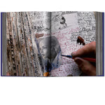 Open view of taschen peter beard book on white background
