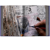 Open view of taschen peter beard book on white background