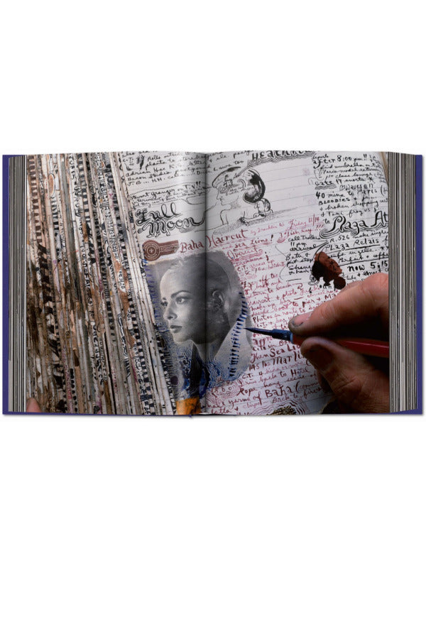 Open view of taschen peter beard book on white background
