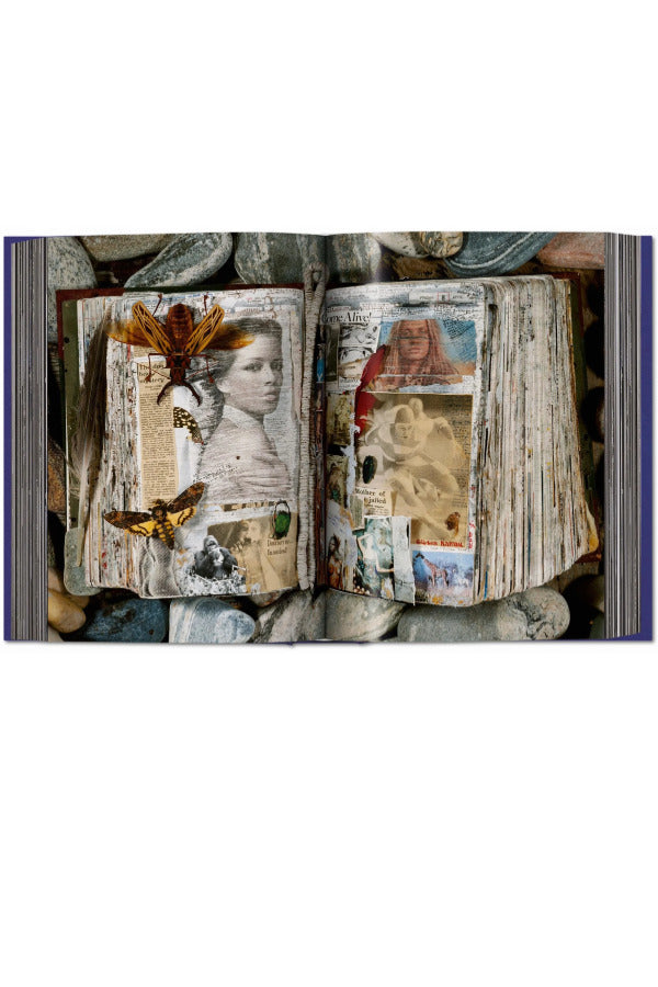 Open view of taschen peter beard book on white background.