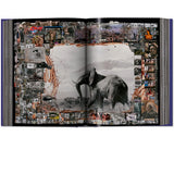 Open view of taschen peter beard book on white background.