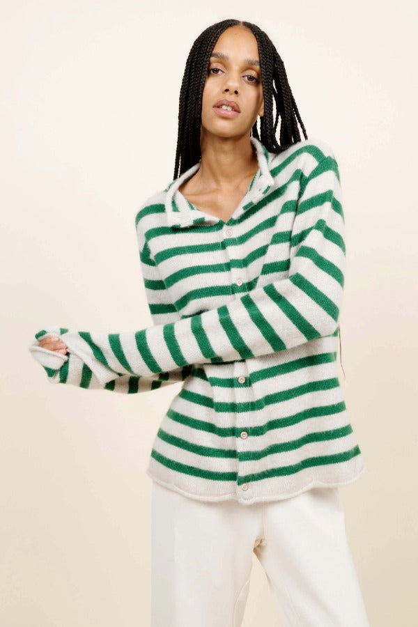 Alternate front view of fern/white costeau stripe cardigan on model wearing white pants, against a white background.