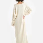 Back view of natural nora lite oversized dress on white background, with no model shown.