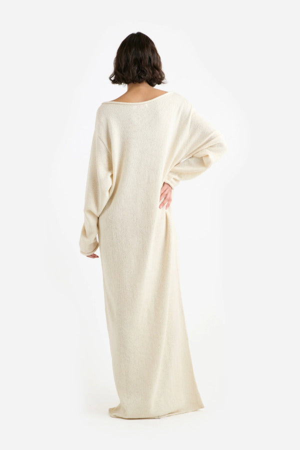 Back view of natural nora lite oversized dress on white background, with no model shown.