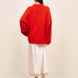 Back view of cherry pali crew on model wearing white slip and platforms, against a white background.