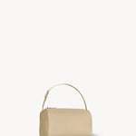 Front slanted view of sand 90's bag on white background, with no model shown.