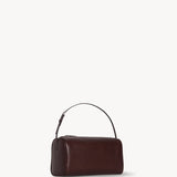 Front slanted view of burgundy 90's bag on white background, with no model shown.