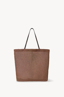 Front view of mesh and leather bag in acero on white background, with no model shown.