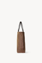 Side view of mesh and leather bag in acero on white background, with no model shown.