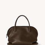 Front view of deep brown agnes bag on white background, with no model shown.