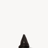 Side view of dark brown agnes pouch on white background, with no model shown.