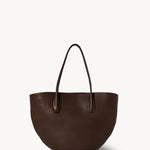 Front view of deep brown alger tote on white background, with no model shown.
