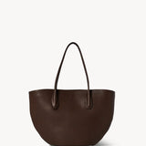 Front view of deep brown alger tote on white background, with no model shown.