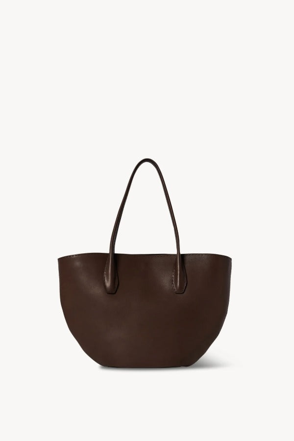 Front view of deep brown alger tote on white background, with no model shown.