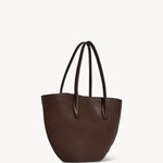 Front slanted view of deep brown alger tote on white background, with no model shown.