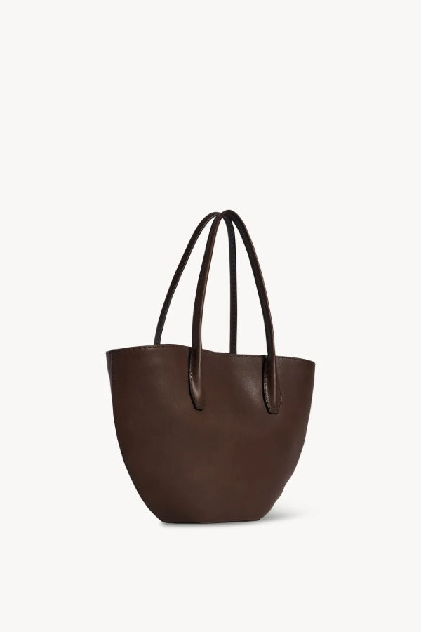 Front slanted view of deep brown alger tote on white background, with no model shown.