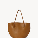 Front view of cuir alger tote on white background, with no model shown.