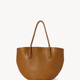 Front view of cuir alger tote on white background, with no model shown.