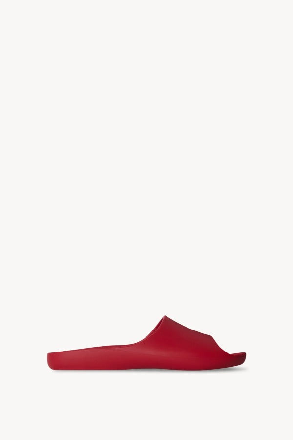 Right side view of red ama slide on white background, with no model shown.