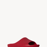 Right side slanted view of red ama slide on white background, with no model shown.