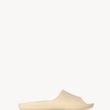 Right side view of toile ama slide on white background, with no model shown.