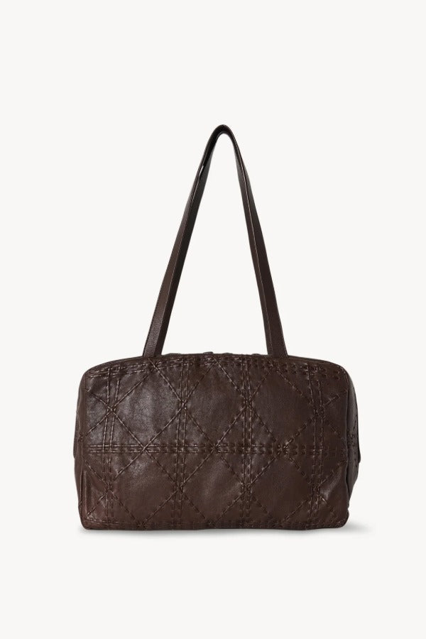 Front view of brown astra bowling bag on white background, with no model shown.