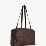 Front slanted view of brown astra bowling bag on white background, with no model shown.