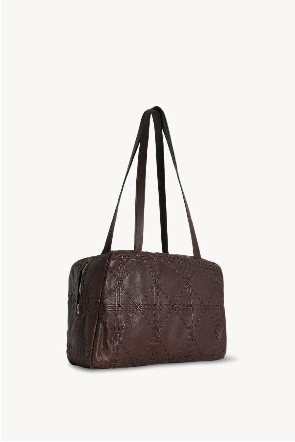 Front slanted view of brown astra bowling bag on white background, with no model shown.