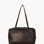 Front view of dark brown astra bowling bag on white background, with no model shown.