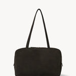 Front view of ebony brown astra bowling bag on white background, with no model shown.