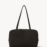 Front view of ebony brown astra bowling bag on white background, with no model shown.