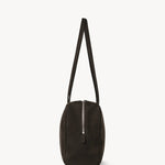 Side view of ebony brown astra bowling bag on white background, with no model shown.