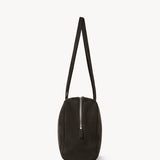 Side view of ebony brown astra bowling bag on white background, with no model shown.