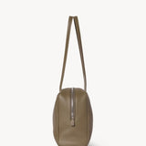 Side view of smoked taupe astra bowling bag on white background, with no model shown.