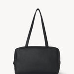 Front view of black astra bowling bag on white background, with no model shown.