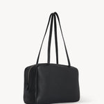 Front slanted view of black astra bowling bag on white background, with no model shown.