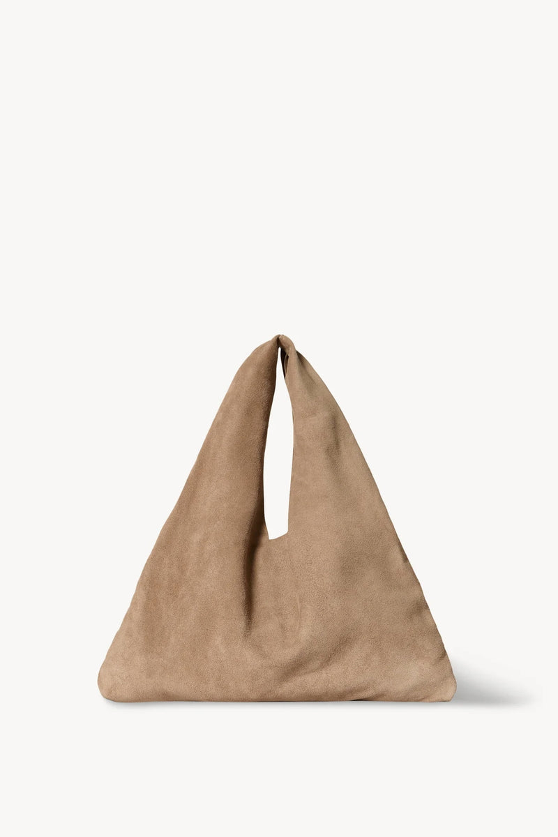 Front view of beige melange suede bag on white background, with no model shown.