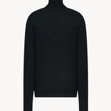 Back view of black bjorn top on white background, with no model shown.
