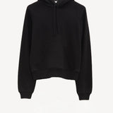 Front view of black timia sweatshirt top on white background, with no model shown.