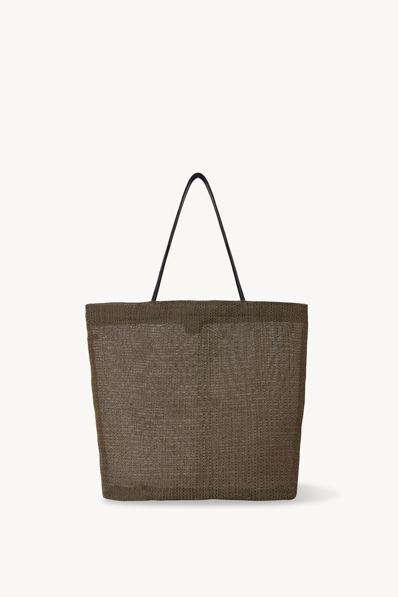 Front view of a mesh and leather blue bag pictured on a white background, with no model shown.