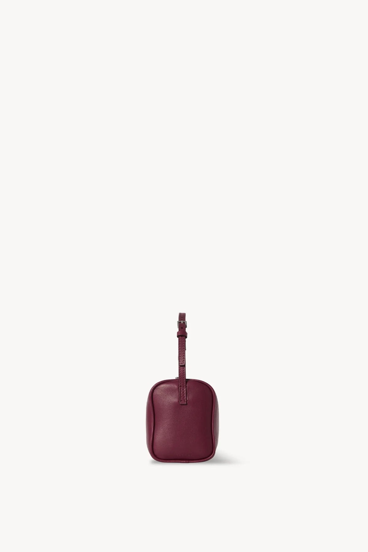 Side view of a purple leather bag on a white background, with no model shown.