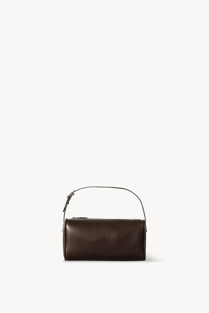 Front view of a brown melange leather bag on white background, with no model shown.
