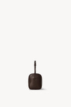 Side view of a brown melange leather bag on white background, with no model shown.
