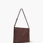 Front slanted view of brown melange nan shoulder bag on white background, with no model shown.