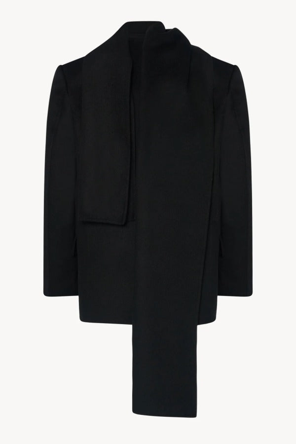 Back view of black calitra jacket on white background, with no model shown.