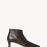 Right side view of lacquer brown carla boot on white background, with no model shown.