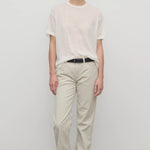 Front view of ice carlyl pant on model wearing white t-shirt and sneakers, against a white background.