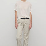 Front view of ice carlyl pant on model wearing white t-shirt and sneakers, against a white background.