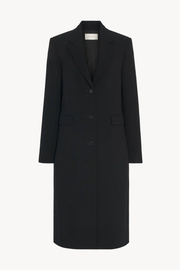 Front view of black cerys coat on white background, with no model shown.