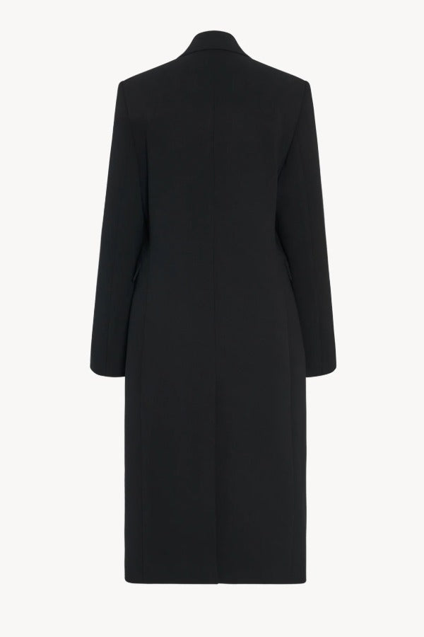 Back view of black cerys coat on white background, with no model shown.